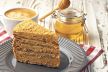 stockphotosliceoflayeredhoneycakeonplate2171566019.jpg
