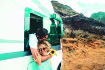 glavna-stockphotohappytravelercoupleenjoysummerdestinationwithcampervanvanlifeandoffgridalternative2176973651.jpg