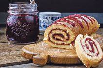 stockphotobiscuitrouladewithcherryjamonabackgroundofwoodenboards280339034.jpg