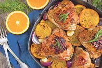 stockphotoroastedchickenwithorangesandherbstopview229454263.jpg