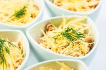 stockphotosaladcheesemushroomschickenmeatdillsauceinwhiteplateonwhitebackground1076374556.jpg