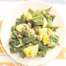stockphotowhiteplatewithasaladofhampotatoesonionsandgreenbeansonacolourfulltablecloth1832207104.jpg