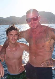 Dejvid Bekam sa mlađim sinom