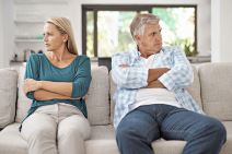 stock-photo-mature-married-and-couple-fight-on-sofa-in-home-people-and-domestic-issue-or-ignore-for-2469846973.jpg
