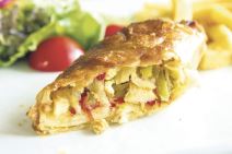 stock-photo-turkish-pacanga-boregi-with-chicken-leek-and-cheddar-melted-cheese-chicken-borek-649264303.jpg
