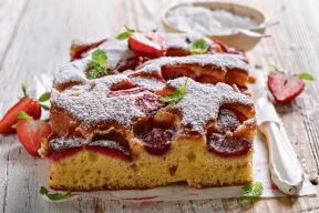 stockphotohotanddeliciousstrawberrycakewithfreshfruitsandsugarhomemadespongecake2159123841.jpg