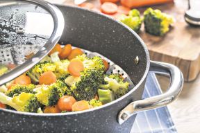 stock-photo-steamed-mixed-vegetable-in-black-pot-healthy-vegetable-concept-1634397787.jpg