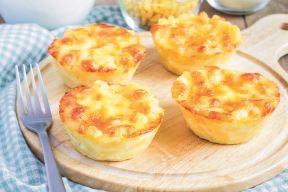 stock-photo-macaroni-and-cheese-baked-as-a-little-pies-289901714.jpg