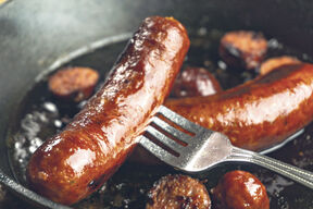 GLAVNA   stock-photo-pan-frying-precooked-juicy-smoked-sausage-with-cast-iron-skillet-2438998189.jpg