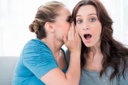 stockphotoblondwomanrevealingsecrettoherfriendandsittingonthesofa149299688.jpg