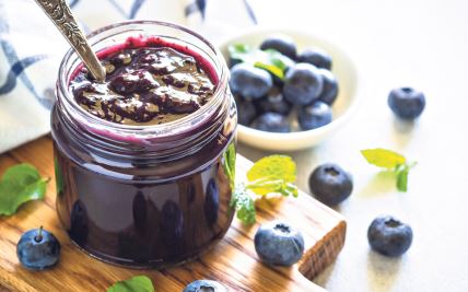 stockphotoblueberryjamintheglassjarwithfreshberries2167422959.jpg