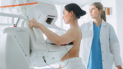 stockphotointhehospitalportraitshotoftoplessfemalepatientundergoingmammogramscreeningprocedure1130966411.jpg