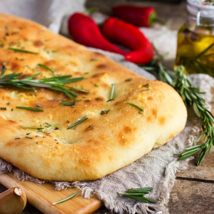 stockphotoitalianfocacciabreadwithrosemaryandgarlicselectivefocussquareimage224574979.jpg