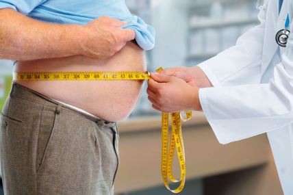 stock-photo-doctor-measuring-obese-man-waist-body-fat-obesity-and-weight-loss-350821031.jpg