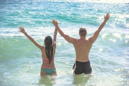 GLAVNA  stock-photo-enjoying-life-vacation-by-the-sea-couple-having-fun-in-the-sea-relaxing-after-the-corona-virus-1990291466.jpg