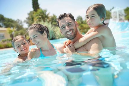 GLAVNA  stock-photo-portrait-of-happy-family-at-the-swimming-pool-in-summer-1123013288.jpg