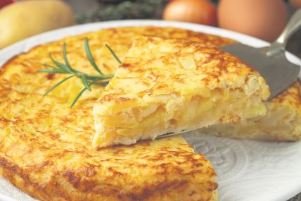 stock-photo-spanish-omelette-with-potatoes-and-onion-typical-spanish-cuisine-tortilla-espanola-rustic-dark-1654929133.jpg