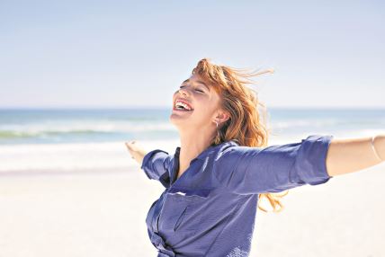 stock-photo-beautiful-girl-in-casual-outfit-enjoying-sunbath-at-beach-with-arms-outstretched-close-up-face-of-2494341939.jpg