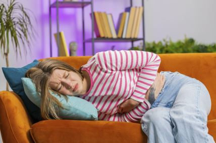 GLAVNA  stock-photo-sick-ill-brunette-woman-suffering-from-period-cramps-painful-stomach-ache-lying-on-home-sofa-girl-2327393323.jpg