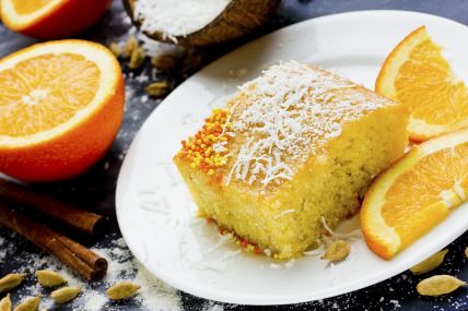 stock-photo-basbousa-namoora-egyptian-semolina-cake-with-orange-sugar-syrup-and-spices-selective-focus-409446412.jpg