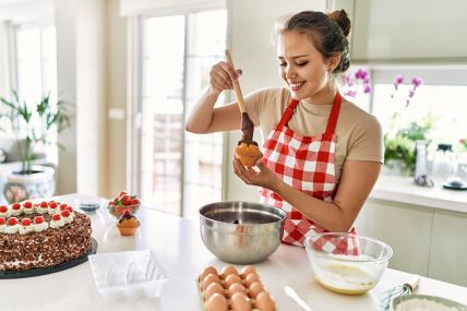 GLAVNA  stock-photo-young-beautiful-hispanic-woman-smiling-confident-putting-chocolate-on-muffin-at-the-kitchen-2233001439.jpg