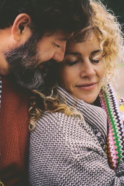 GLAVNA  stock-photo-romantic-adult-couple-stay-together-with-feeling-and-love-covered-by-a-woolen-colorful-blanket-at-2412861151.jpg