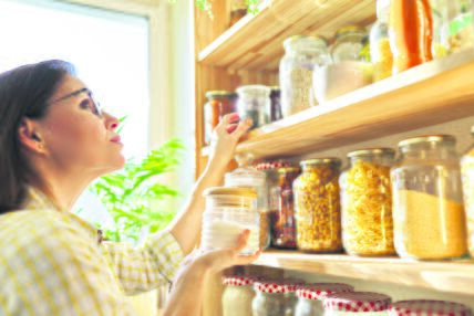 GLAVNA  stock-photo-food-storage-in-pantry-woman-holding-jar-of-sugar-in-hand-pantry-interior-wooden-shelf-with-food-1689960148.jpg