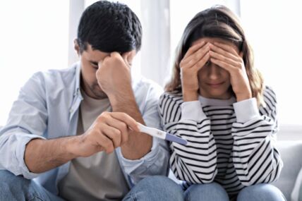 GLAVNA  stock-photo-upset-young-couple-with-pregnancy-test-at-home-2769924629.jpg