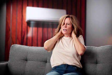 stock-photo-sick-person-having-cold-and-sore-throat-from-air-conditioner-2532654807.jpg