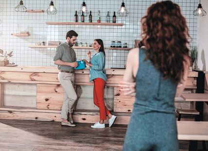 GLAVNA   stock-photo-charming-girl-is-flirting-with-man-and-smiling-she-is-touching-gift-present-in-male-hands-with-1069724801.jpg