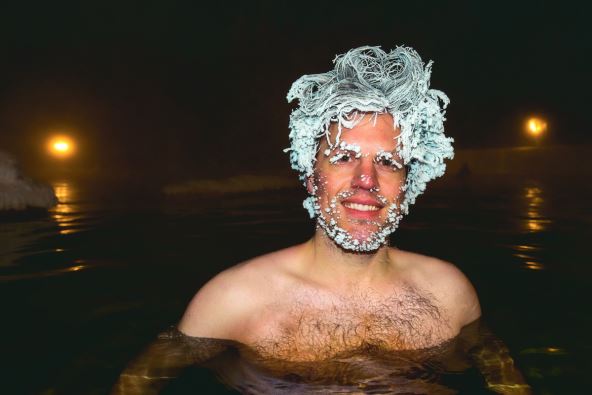 stockphotomanwithfrozenhairafterbeinginthehotspringsinyukonterritorycanadathistookabout1665830251.jpg
