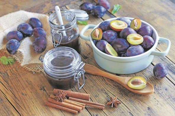 stockphotofreshhomemadeplumjamonwoodentable2149062135.jpg