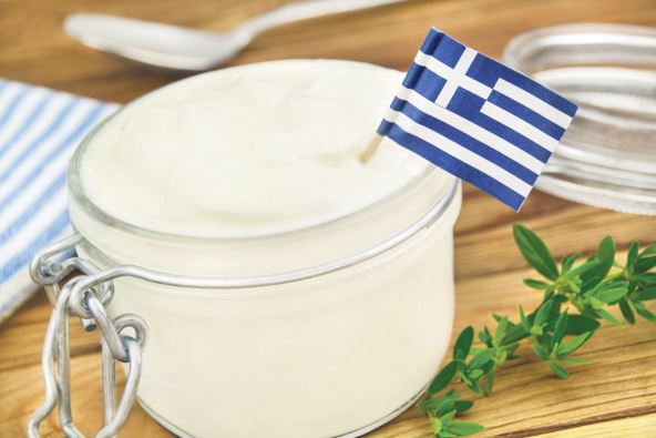 stockphotogreekyogurtandflagonwoodentable2014198688.jpg