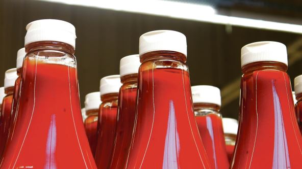 kecap--stockphotocloseupofmanybeautifulbottlesofketchuportomatosauceinasupermarket2285212437.jpg