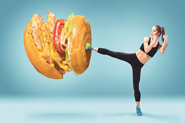 glavna-stockphotofityoungenergeticwomanboxinghamburgerasunhealthyfood402739198.jpg