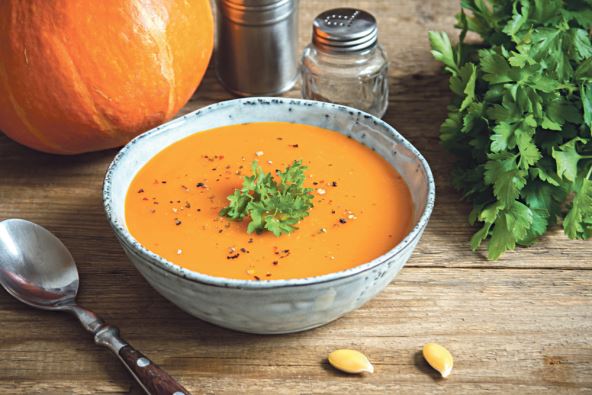 stockphotopumpkinsoupandorganicpumpkinsonrusticwoodentableseasonalautumnfoodspicypumpkinans717254638.jpg