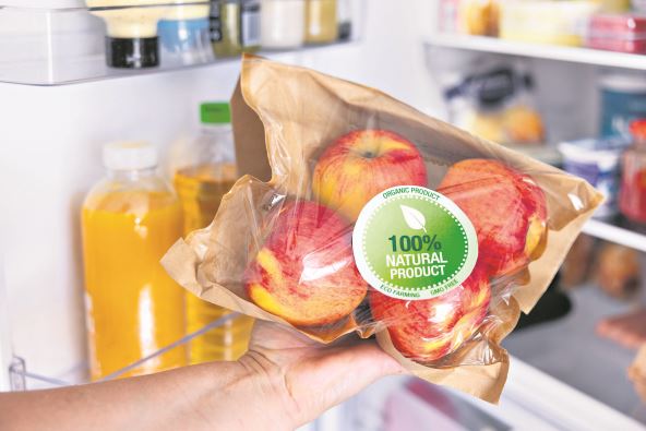 100--natural--stockphotowomanholdingpackageofecologicallygrownapplesconceptofeatinghealthynaturalproducts2201191669.jpg
