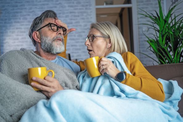 glavna-stockphotoelderlymanandwomanwithflucoupleofoldagedseniorpeopleathomewithseasonalwintercold2408023059.jpg