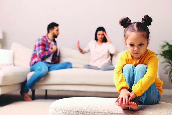 antr--stockphotosadlittlegirlandherarguingparentsonsofainlivingroom2150117627.jpg