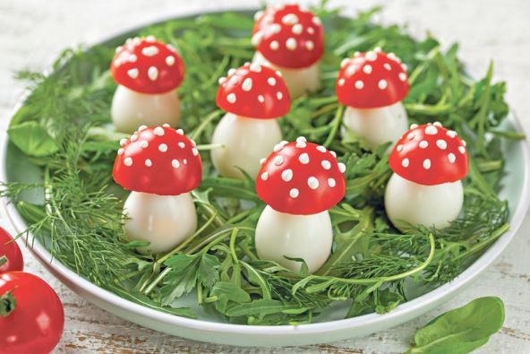 stockphotofoodartideaedibleflyagaricmushroomsmadeodtomatoesandquaileggshealthyandfunny2422123149.jpg