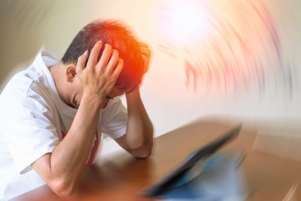 stockphotobraindiseasesproblemcausechronicsevereheadachemigrainemaleadultlooktiredandstressed1901190304.jpg