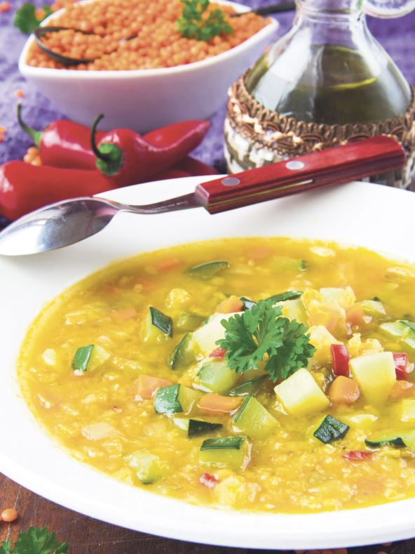stockphotohomemadevegetablesoupwithredlentilschilipepperandzucchiniinawhiteceramicplate138966341.jpg