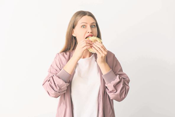 glad--stockphotowomanwithproblemofstronghungeronlightbackgrounddiabetessymptoms2083386205.jpg