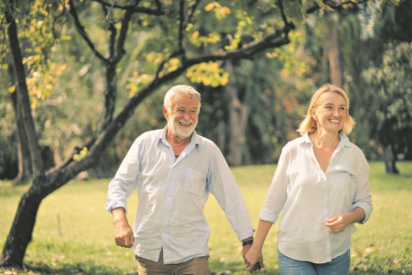 antrfile--stockphotoseniorcouplesmilingandrelaxinginaparkonasunnyday1045986439.jpg