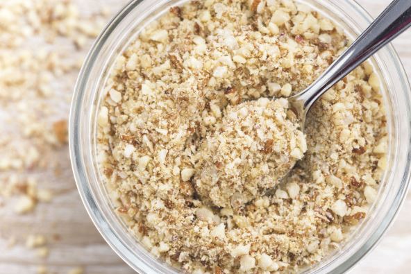 stock-photo-ground-almonds-in-a-glass-jar-top-view-closeup-horizontal-313988534.jpg