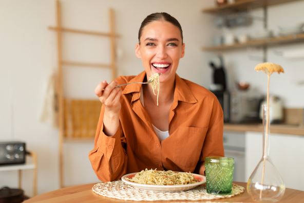 RUCAK MORA DA BUDE LAGAN    stock-photo-happy-young-european-lady-eating-delicious-homemade-italian-pasta-enjoying-tasty-lunch-looking-at-2340250571.jpg