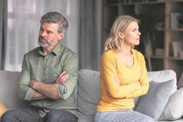 stock-photo-crisis-in-relations-middle-aged-husband-and-wife-offending-to-each-other-after-argue-grumpy-2182946317.jpg