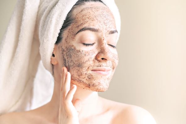 stock-photo-spa-mask-at-home-young-woman-with-towel-on-her-head-with-scrub-on-her-face-1718732656.jpg