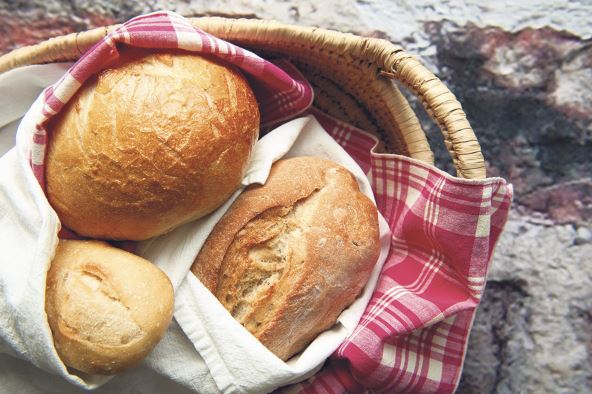 HLEB  stock-photo-a-variety-of-fresh-baked-bread-loaves-wrapped-in-country-style-linens-in-a-basket-against-rustic-2476246989.jpg
