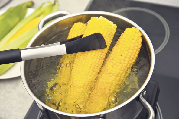 ANTRFILE   stock-photo-taking-boiled-corn-from-pot-with-tongs-in-kitchen-closeup-1849116346.jpg